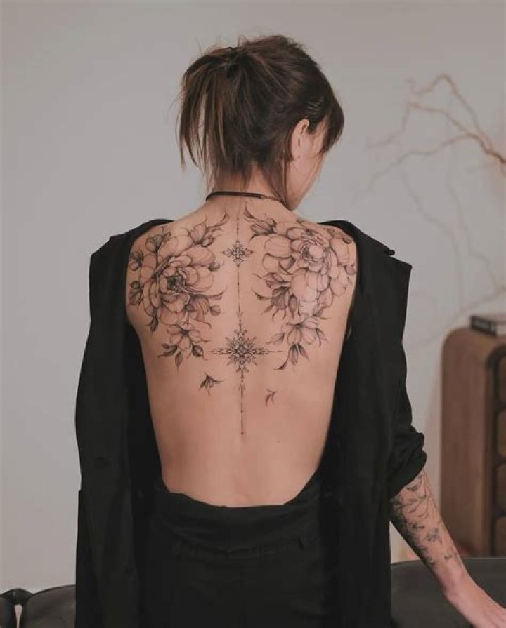 Unveiling The Enchanting Canvas Of Upper Back Tattoos For Women